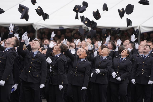 Newly Garda graduates celebrating at the Garda College graduation ceremony at McCan Barracks in Templemore, Co Tipperary