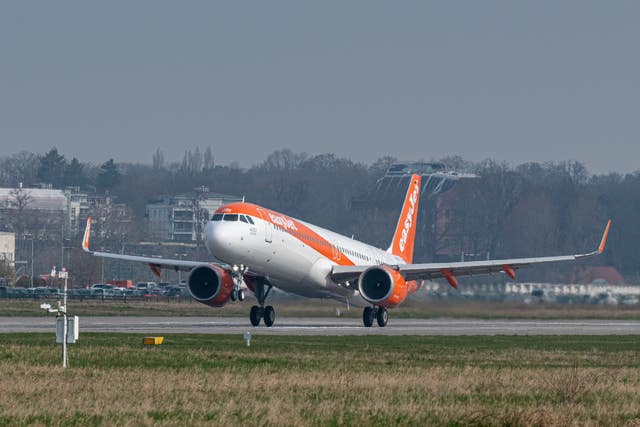 Undated handout photo issued by easyJet of one of its planes on the runway