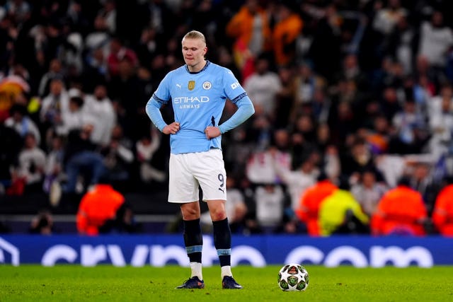 Manchester City’s Erling Haaland stands dejected after his team concede a goal