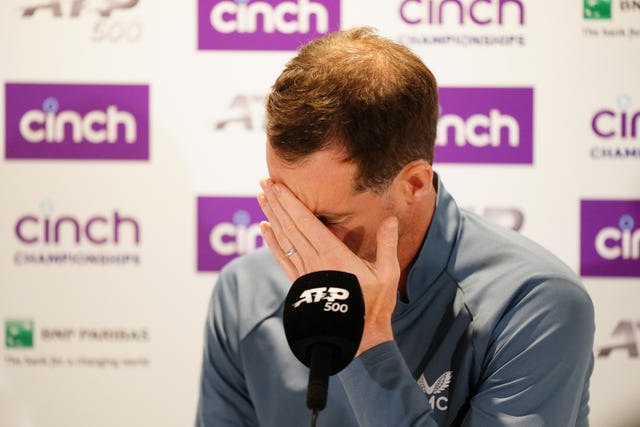 Andy Murray looks upset during a press conference at Queen's Club