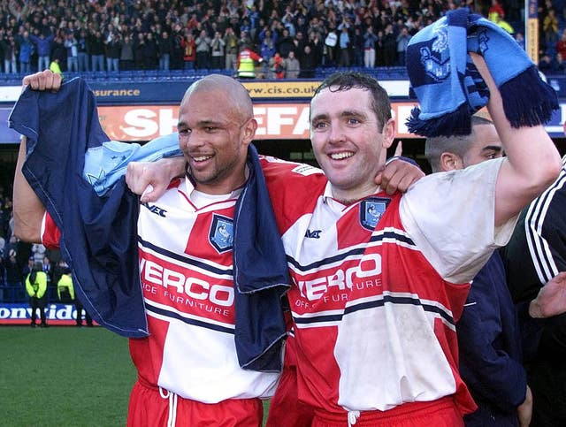 Wycombe Wanderers’ goalscorers Paul McCarthy (left) and Roy Essandoh celebrate victory after the final whistle in the FA Cup sixth round match at Filbert Street, Leicester. 