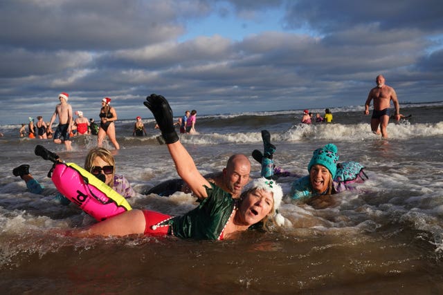 Swimmers take part in the annual Boxing Day Dip at Tynemouth Beach
