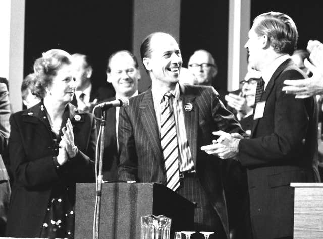 Norman Tebbit joined by Margaret Thatcher and Cecil Parkinson for his standing ovation after a speech at the Conservative Party Conference