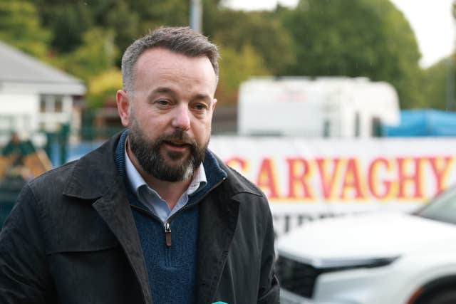 Head and shoulders photo of Colum Eastwood speaking, on the Garvaghy Road