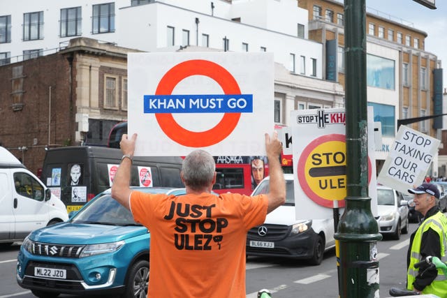 People take part in a protest against the Ulez expansion in Tooting