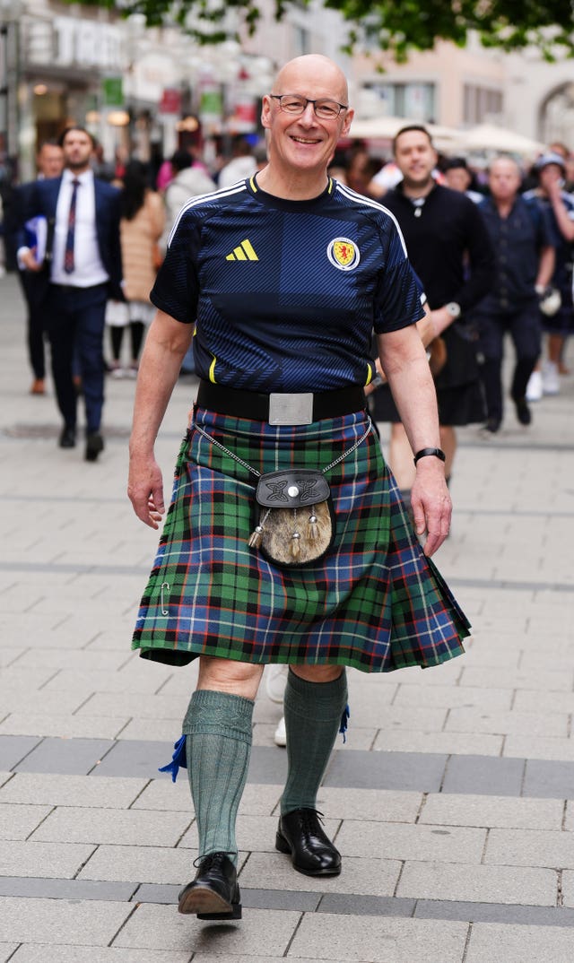 First Minister of Scotland John Swinney wearing a Scotland top and a kilt in Munich during Euro 2024 