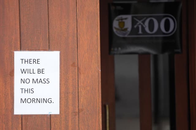 A sign on the door at St Patrick’s Garrison Church at Renmore Barracks saying 'There will be no Mass this morning'