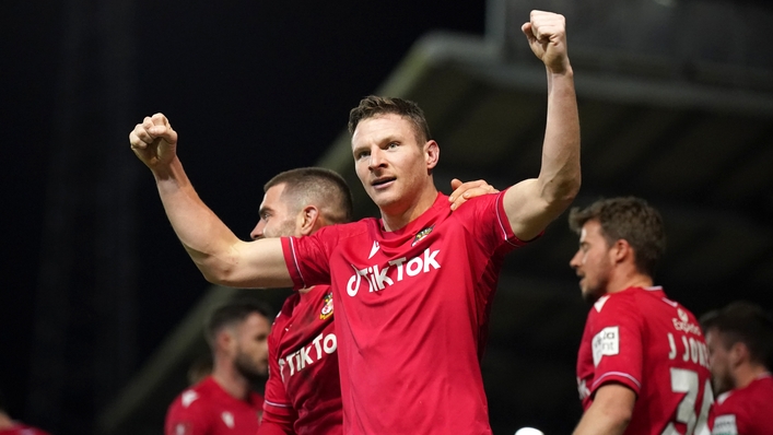 Paul Mullin scored twice to extend Wrexham’s lead at the top of the National League (Peter Byrne/PA)