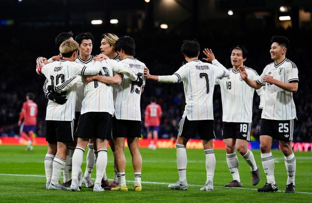 Japan players celebrate