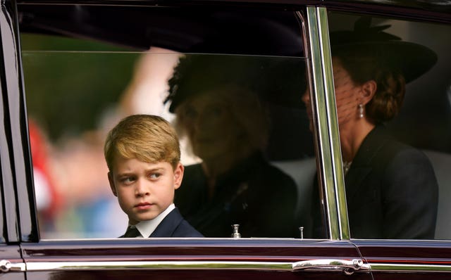 Prince George and the Princess of Wales, travel in a car behind the Queen's coffin to Wellington Arch (Tim Goode/PA)