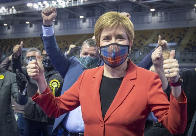 Nicola Sturgeon wearing a mask and celebrating at the 2021 Holyrood election count in Glasgow