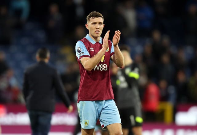 Dara O'Shea applauds Burnley fans after their <b><a href=