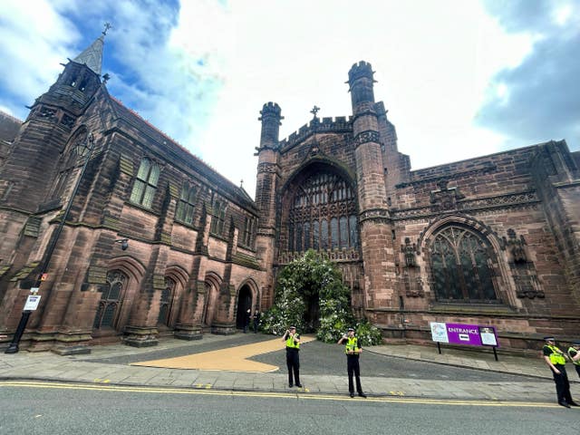 Police outside Chester Cathedral before the wedding of Hugh Grosvenor, the Duke of Westminster, to Olivia Henson