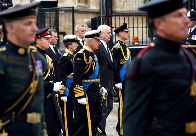 The King, Princess Royal, the Duke of York and the Earl of Wessex as the coffin of the Queen leaves Westminster Hall for the state funeral at Westminster Abbey (Yui Mok/PA)