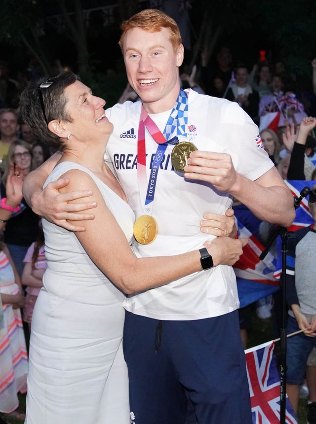 Dean pictured with his mum Jacquie Hughes at a welcome home event after the Olympics last summer