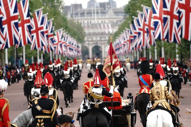 The royal party departs Buckingham Palace 