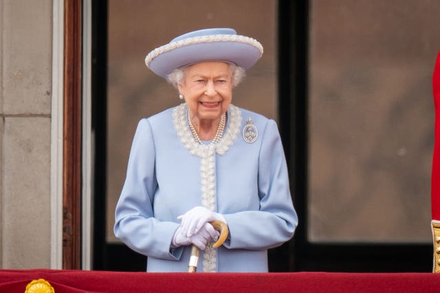 The Queen watching from the balcony at Buckingham Palace for the Trooping the Colour ceremony at Horse Guards Parade, central London, as the Queen celebrates her official birthday, on day one of the Platinum Jubilee celebrations 