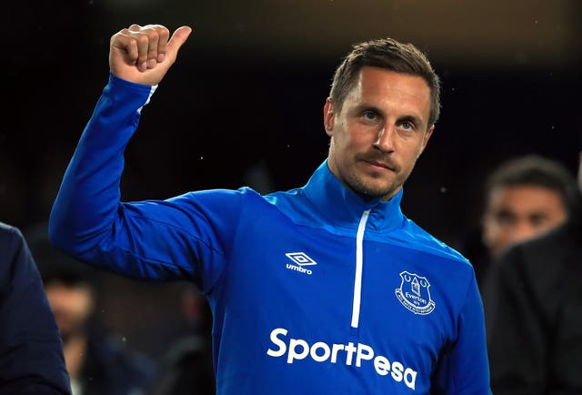 Phil Jagielka salutes the fans after Everton's final home game of the season against Burnley