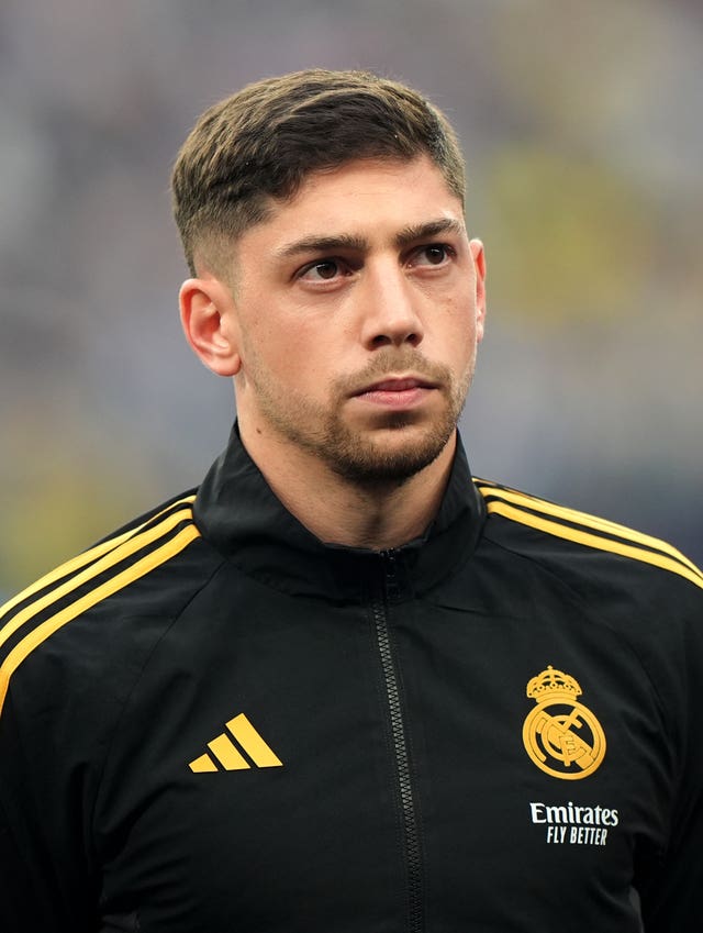 Federico Valverde in a Real Madrid tracksuit top before a game