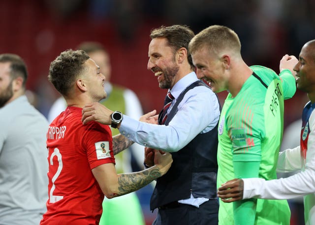 England manager Gareth Southgate (centre) celebrates with players