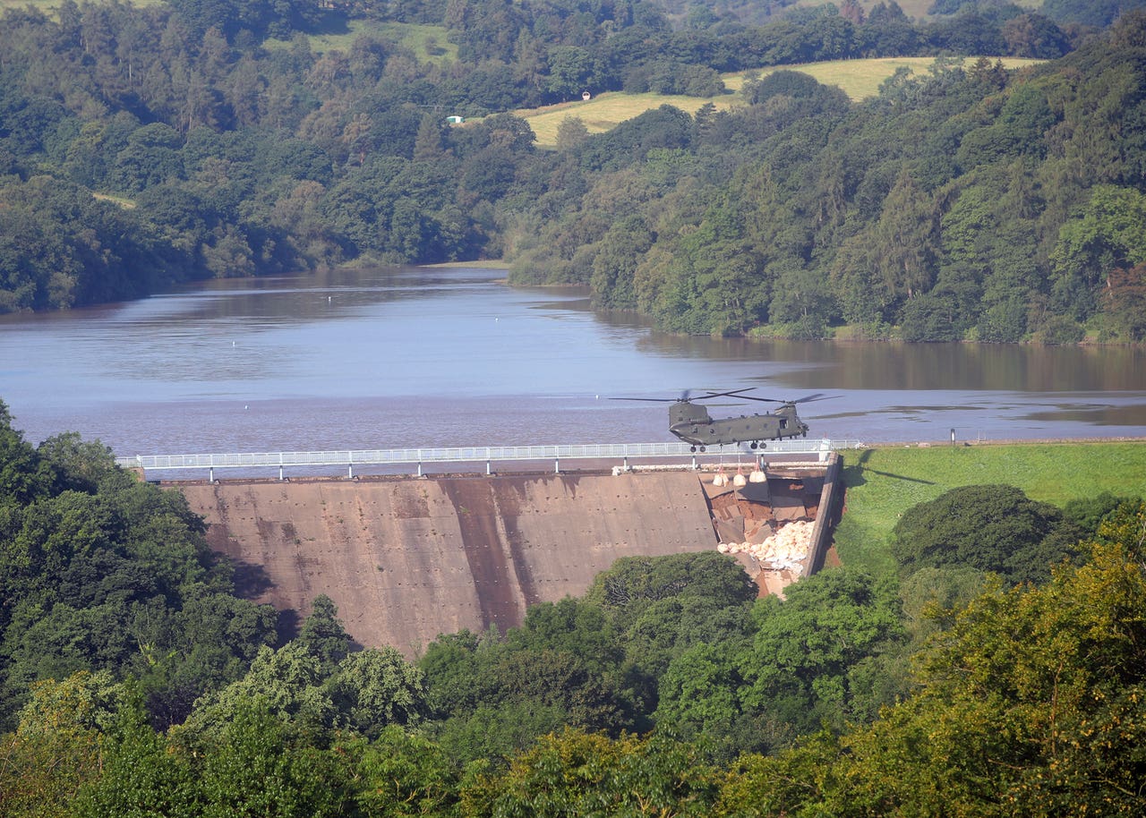 Damaged dam remains at ‘critical level’ as residents return home for