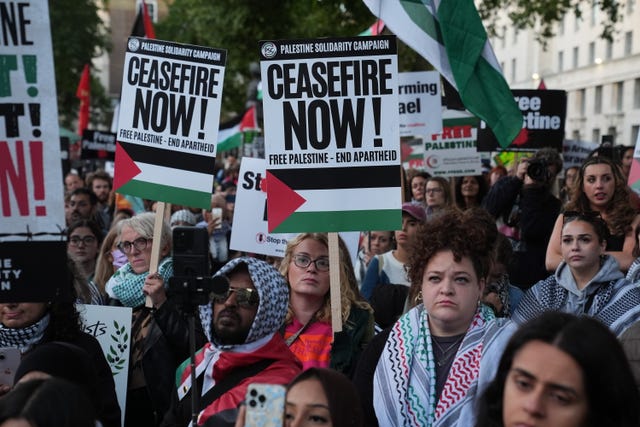 People taking part in a Palestine Solidarity Campaign rally