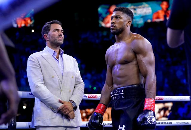 Eddie Hearn (left) says the fight can still happen but wants Tyson Fury to stop setting deadlines