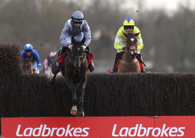 Il Est Francais ridden by James Reveley (left) winning the Ladbrokes Kauto Star Novices’ Chase 