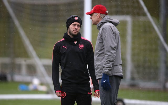 Arsenal manager Arsene Wenger (right) and Jack Wilshere during training