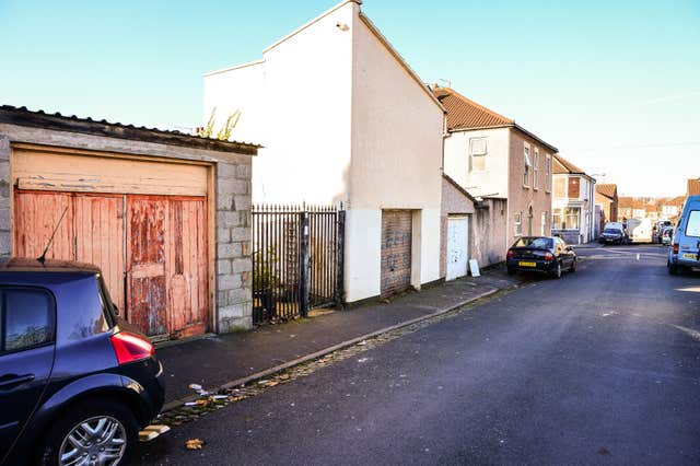 The gated entrance and garages on King Street, Easton, Bristol, where Judah Adunbi was Tasered (Ben Birchall/PA)