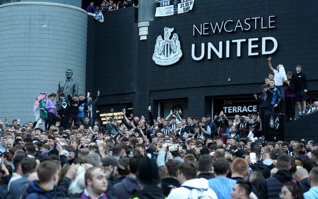 Newcastle fans celebrate at St James’ Park following the Saudi-led takeover 