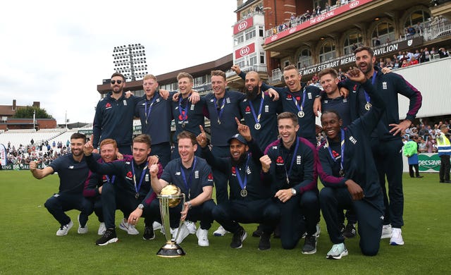 Chris Woakes, Eoin Morgan and the rest of the England team celebrate their World Cup win