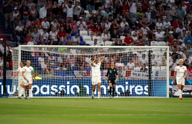 England players react to the USA's second goal