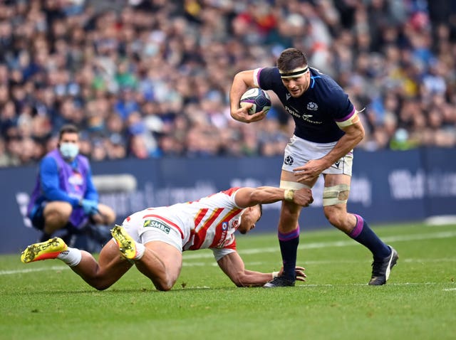 Josh Bayliss (right) in action for Scotland
