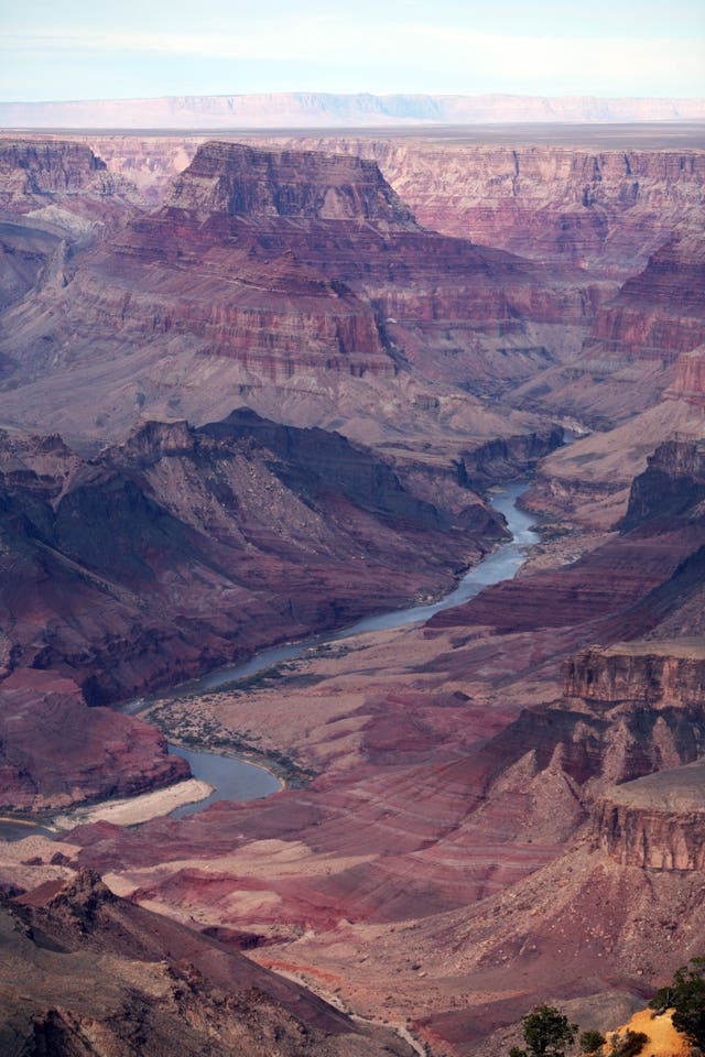The Colorado river passes through the Grand Canyon (Martin Keene/PA)
