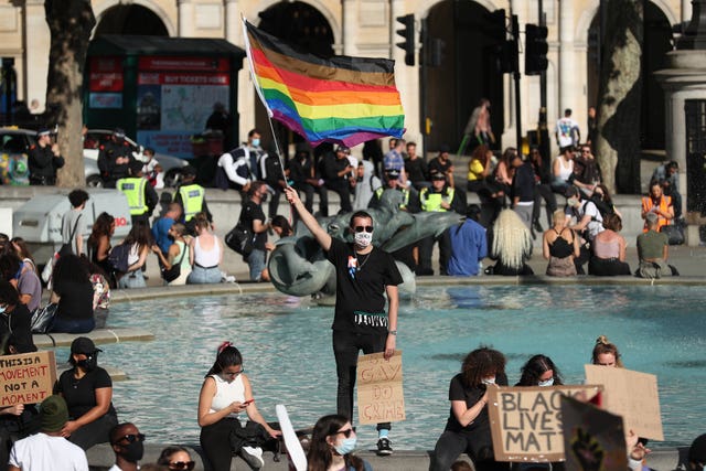 People gather in Trafalgar Square, London, after marching through central London following a Black Lives Matter rally in Hyde Park 