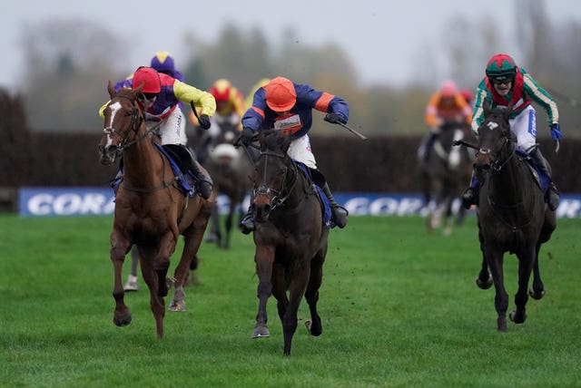 Le Milos and jockey Harry Skelton (centre) bid to follow up their Coral Gold Cup victory