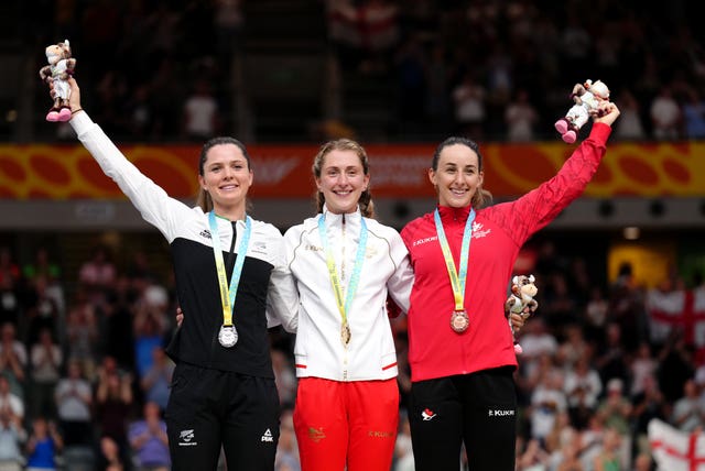 Dame Laura Kenny (centre) with her 2022 Commonwealth gold