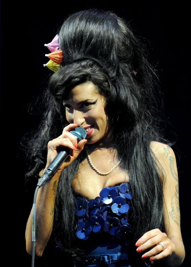 Amy Winehouse performs on the Pyramid Stage during day two of the Glastonbury Festival