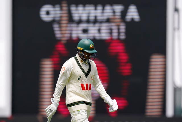 Usman Khawaja walks off after being dismissed in the fourth Ashes Test.
