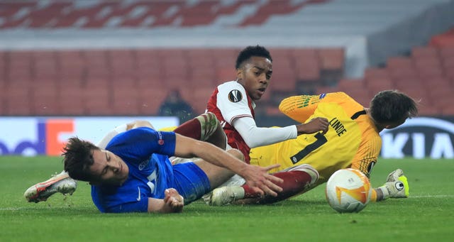 Kristoffer Haugen (left) scored an own goal to pull Arsenal level