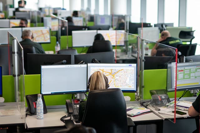 Staff working at the LAS emergency operations centre in Newham, east London
