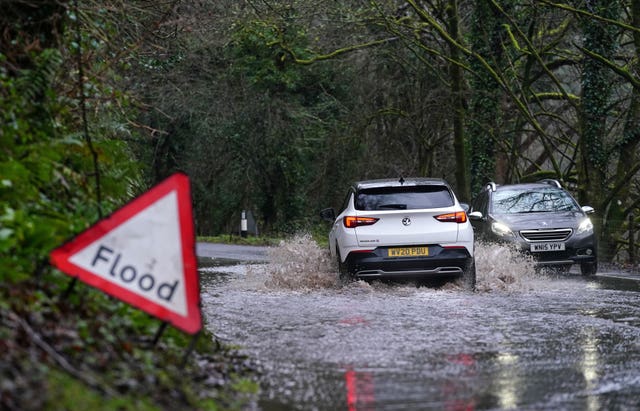 Drivers have been urged to avoid passing through floodwater (David Davies/PA)