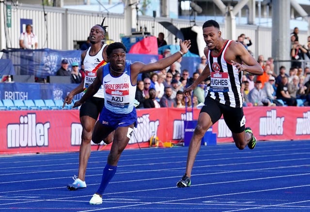Jeremiah Azu (centre) was the men's 100m champion in Manchester (Martin Rickett/PA).
