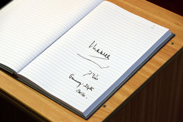 The Prince of Wales’ signature on a book at the mosque