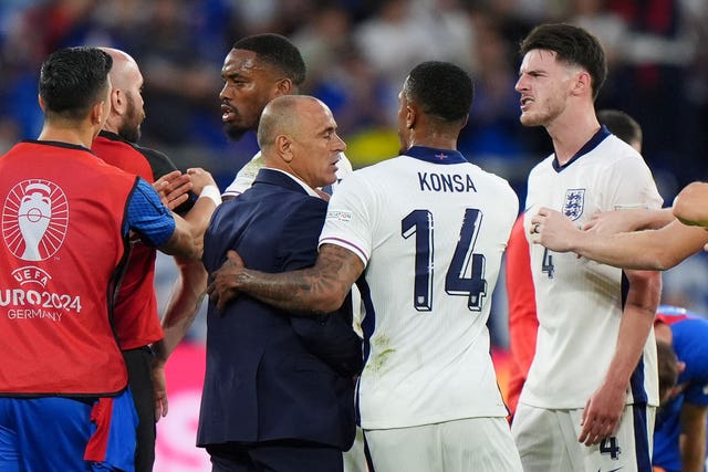 Tempers flare between England’s Declan Rice and Slovakia manager Francesco Calzona at full-time