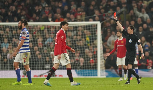 Andy Carroll, left, is sent off against Manchester United
