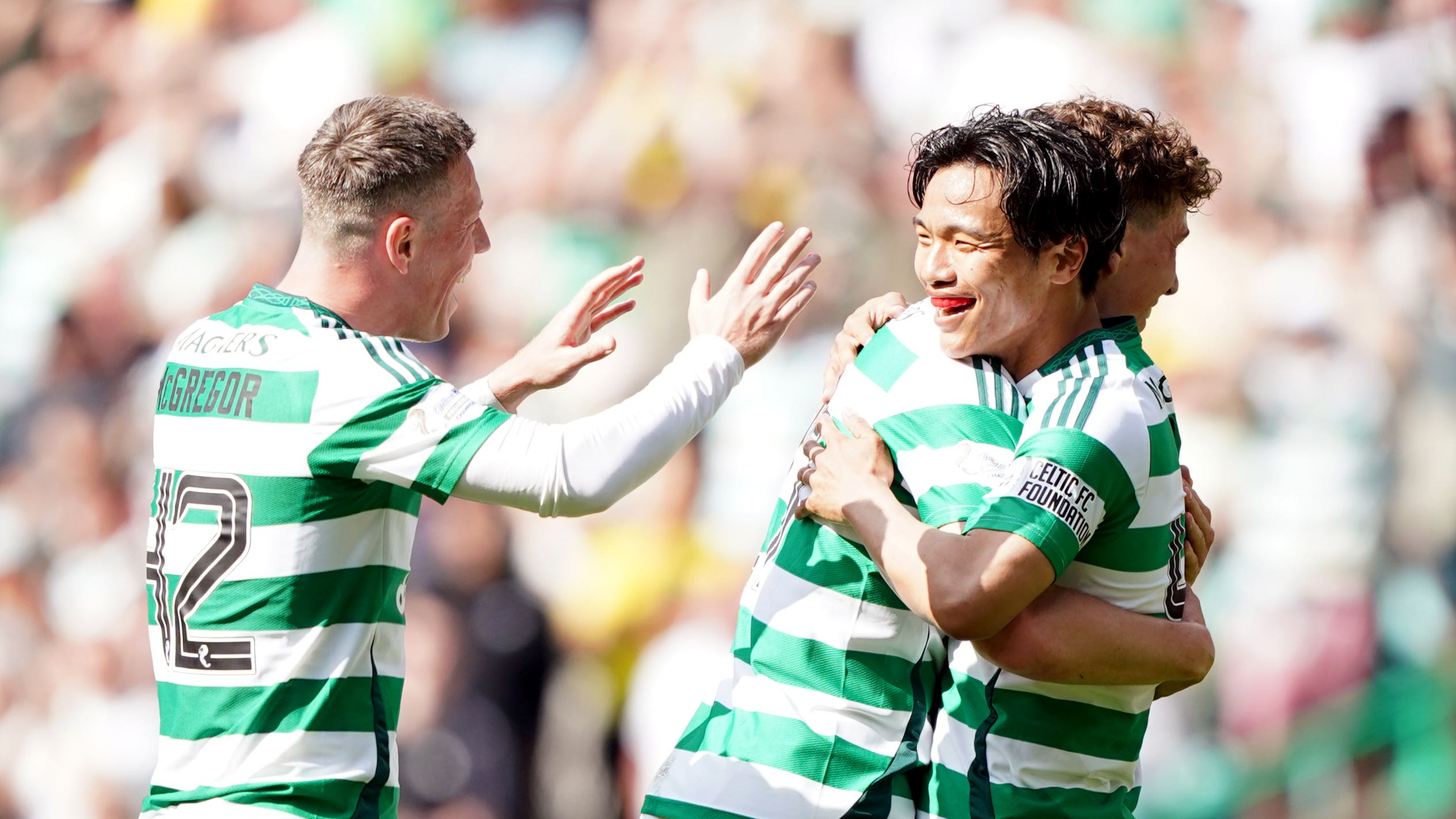 Reo Hatate celebrates scoring Celtic’s third goal (Andrew Milligan/PA)