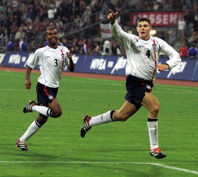 Steven Gerrard points towards the England fans as he celebrates a goal against Germany