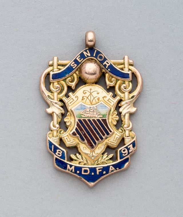 The earliest Manchester United football medal, when the club was known as Newton Heath, sold for £24,100 (Graham Budd Auctions)
